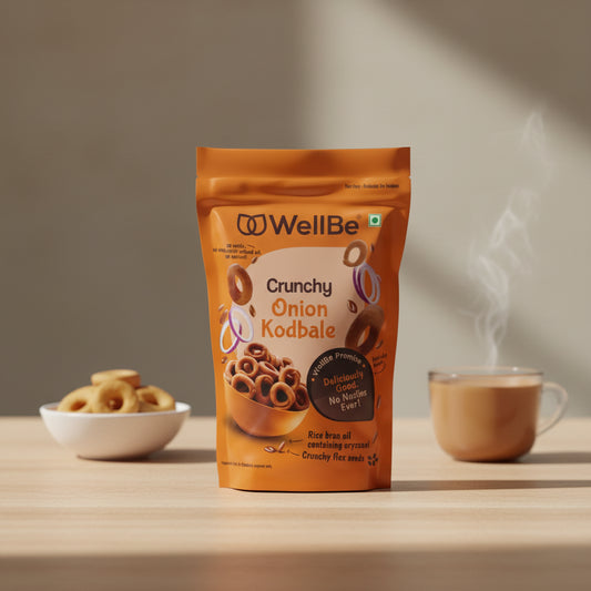 WellBe Crunchy Onion Kodbale packaging on a wooden table with a blurred background